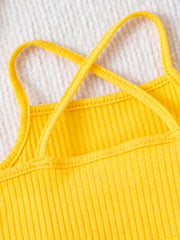 Girls Ribbed Knit Crossback Asymmetric Crop Cami - Solar | 21 Centu...