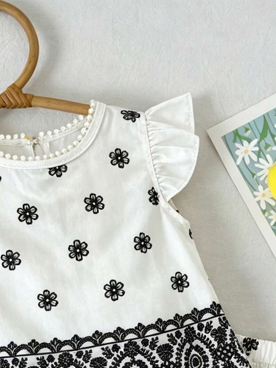2pcs Girls Floral Embroidered Flutter Sleeve Top & Shorts Set - Ivo...